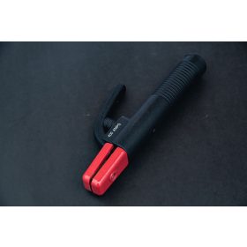 Heg.gép kieg.     ELEKTRÓDAFOGÓ 400 A