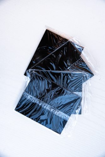 Heg.gép kieg.     ELŐTÉT   üveg   fekete DIN 10